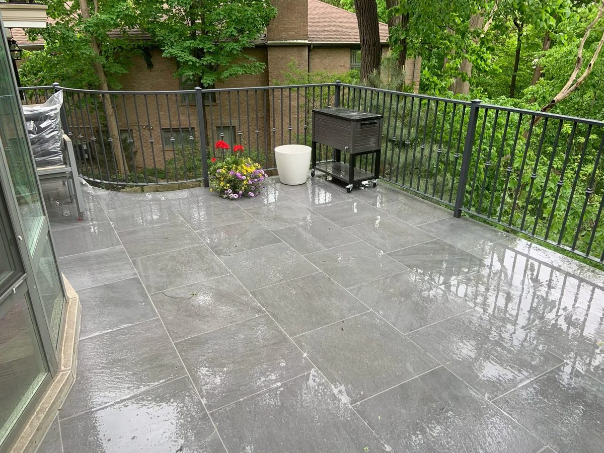 Another rainy view of the same balcony patio.