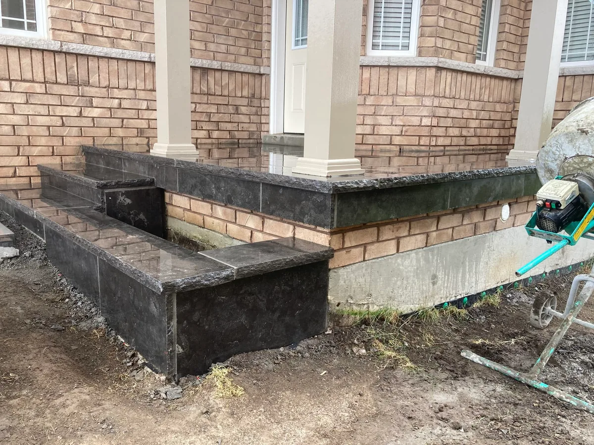 A similar low-angle detail of the stone step edge.